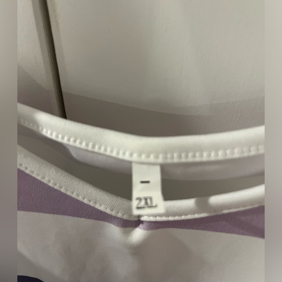 Striped dress with pockets and tie straps. - Picture 2 of 4